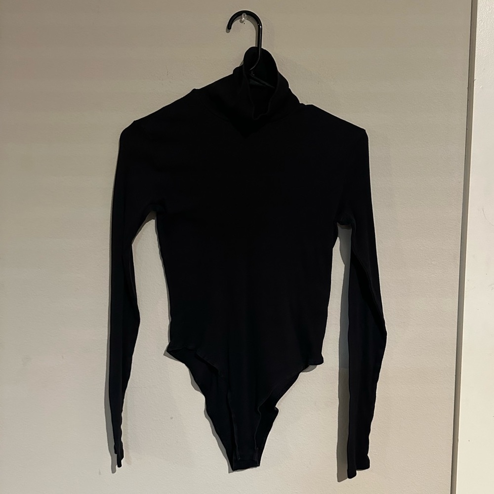 EUC: Solid Black Long Sleeve Turtleneck Bodysuit.
